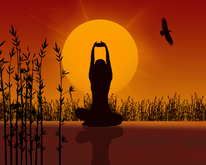 girl meditating at sunrise